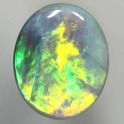 SOLID SEMI BLACK OPAL Neon orange turns to neon green in a broad rolling flash